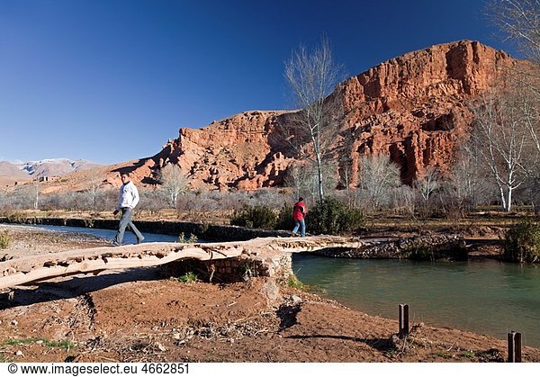 Morocco Dades Valley Dades Gorge with footbridge across the river
