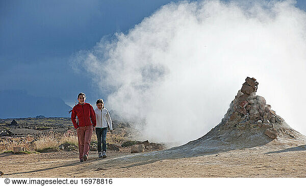 Mother and daughter exploring the geothermal hot spring area at Myvatn