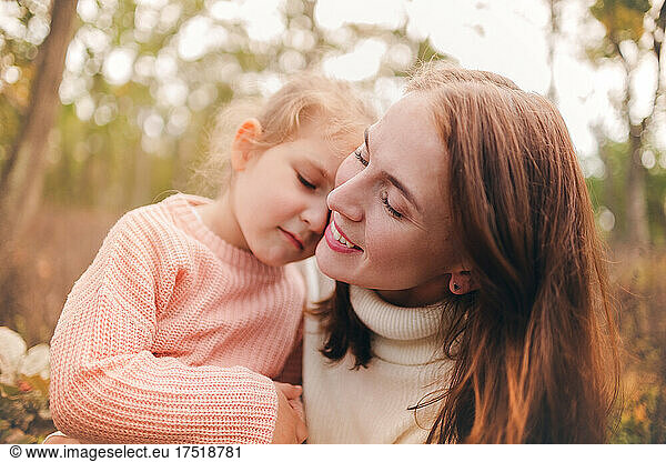 Mother And Daughter Expressing Love For Each Other