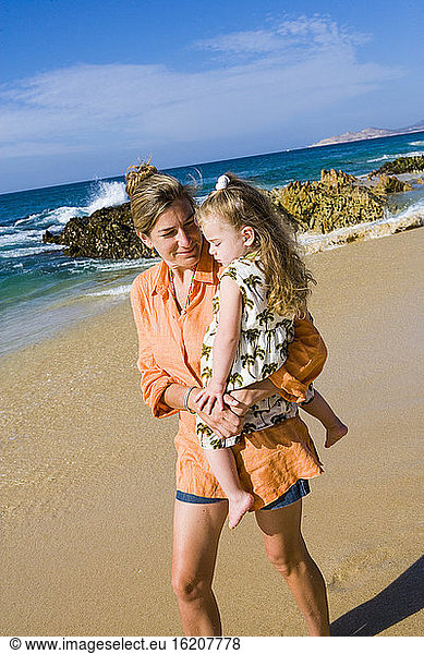 mother and daughter on beach  Cabo San Lucas  Mexico