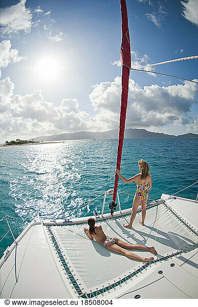 Mother and daughter sailing in the tropics.
