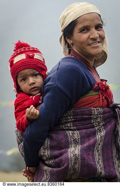 Mother and son  Ghandruk  Annapurna Conservation Area  Nepal  Asia