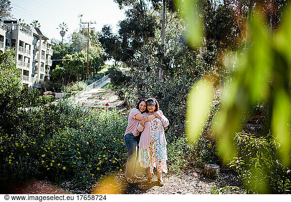 Mother & Daughter Posing on Trail in Neighborhood in San Diego