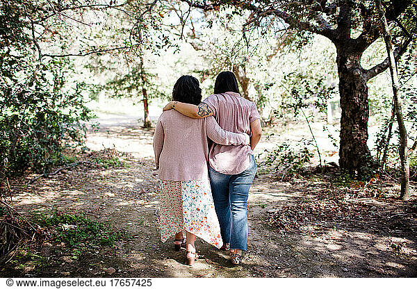 Mother & Daughter Walking Together on Trail in San Diego