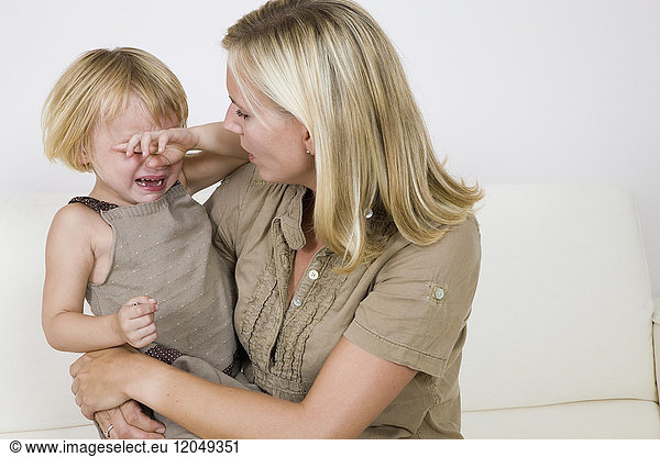 Mother Soothing Crying Child