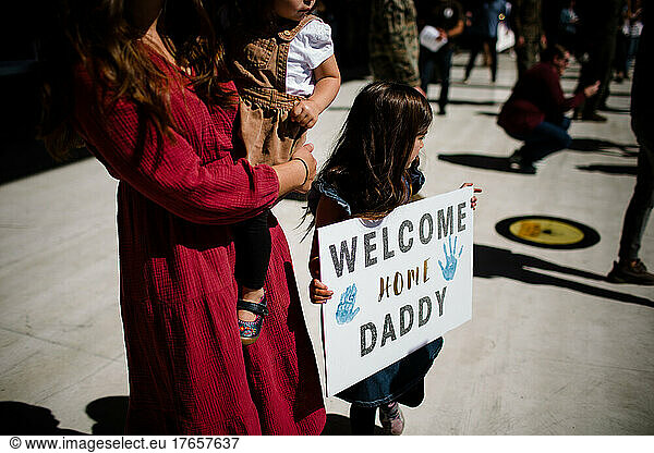 Mother & Two Daughers Waiting for Military Homecoming in San Diego