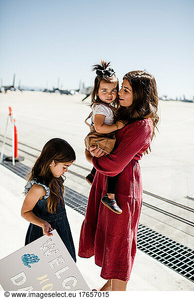 Mother & Two Daughters Waiting for Military Homecoming in San Diego