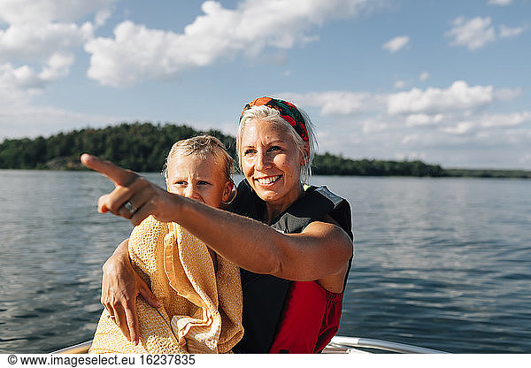 Mother with daughter on boat