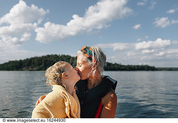 Mother with daughter on boat