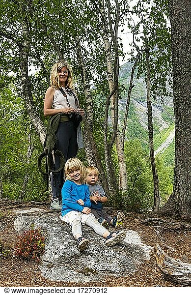 Mother with her two children  Gudbrandsjuvet  Trollstigen mountain road  Norway  Europe