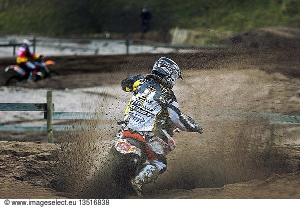 Motocross rider at a motocross race  Grevenbroich  North Rhine-Westphalia  Germany  Europe