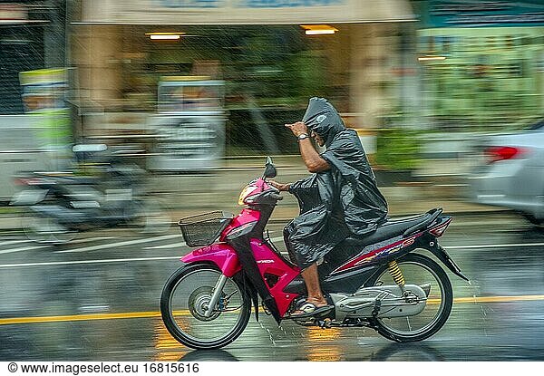 Motor scooter on rainy afternoon in Phang-nga  Thailand.