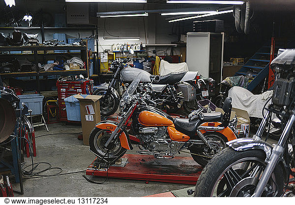 Motorcycles in auto repair shop