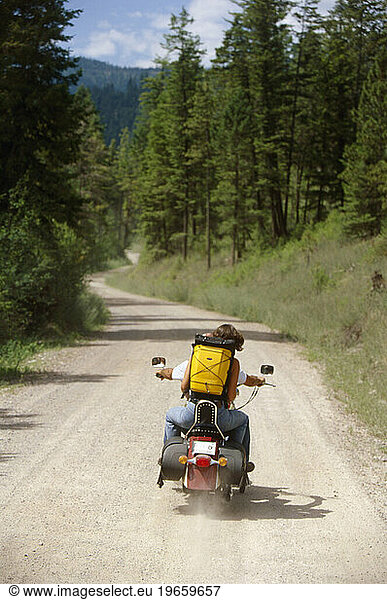 Motorcyle on dirt road in Montana.