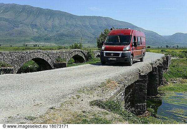 Motorhome on old bridge near Grapsh  SH4  Albania  Europe