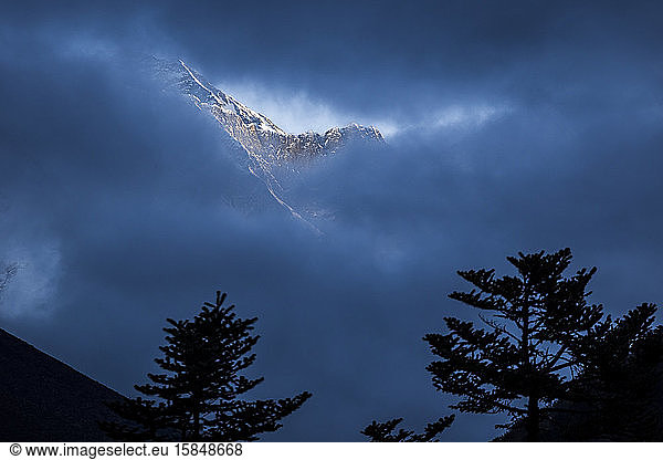 Mount Everest seen though the clouds  Khumbu Region  Nepal Himalay