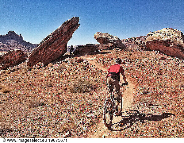 Mountain bikers on the Bar-M trails  Moab  Utah.PLEASE NOTE: This image is part of Aurora's myPhone Collection of images taken with mobile devices. Available file sizes vary  and
