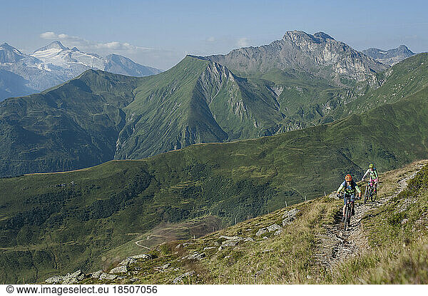 Mountain bikers riding on uphill  Zillertal  Tyrol  Austria