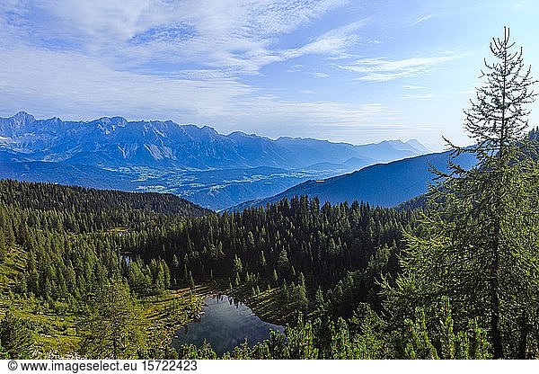 Mountain lake Untersee  behind mountain silhouette  Dachstein massif  Schladminger Tauern  Styria  Austria  Europe