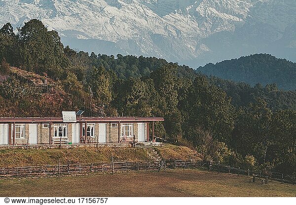 Mountain lodge in front of Annapurna massif. Annapurna Conservation Area. Nepal.