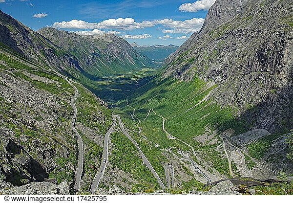Mountain road winds up the mountain in serpentines  steep mountains  summer  Trollstigen  Andalsnes  Western Norway  Norway  Europe