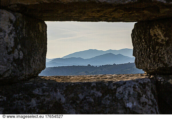 Mountain view from ancient wall at archaeological site of Orraon  Arta  Greece