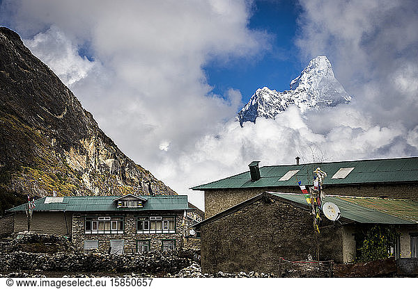 Mountain village with Ama Dablam behind in the Everest region of Nepal