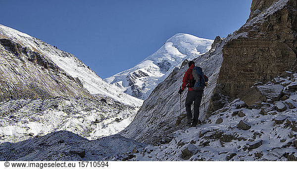 Mountaineer at Chonbarden Glacier  Dhaulagiri Circuit Trek  Himalaya  Nepal