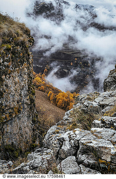 Mountainous landscape of North Caucasus on foggy autumn day
