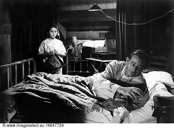 movie  Trouble Along the Way  USA  1953  director: Michael Curtiz  scene with: John Wayne  attif floor  loft  apartement  room   lying in bed  child  girl