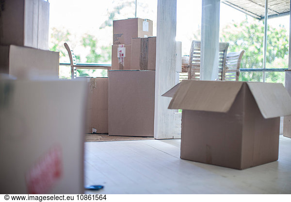 Moving house: Room filled with cardboard boxes