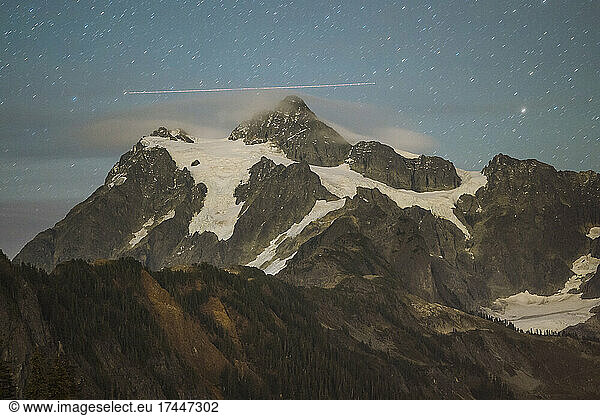 Mt Shuksan Night Photo With Plane Lights Streaking Over The Summit