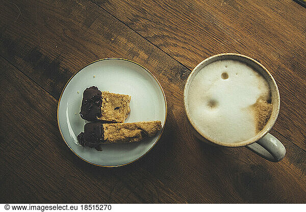 Mug of coffee and slices of pie