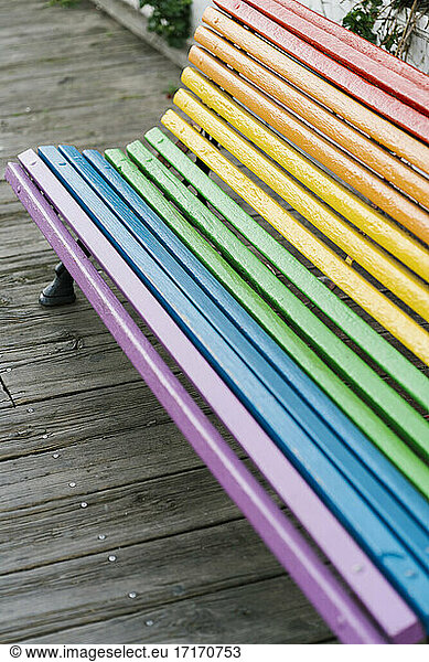 Multi colored painted bench at park