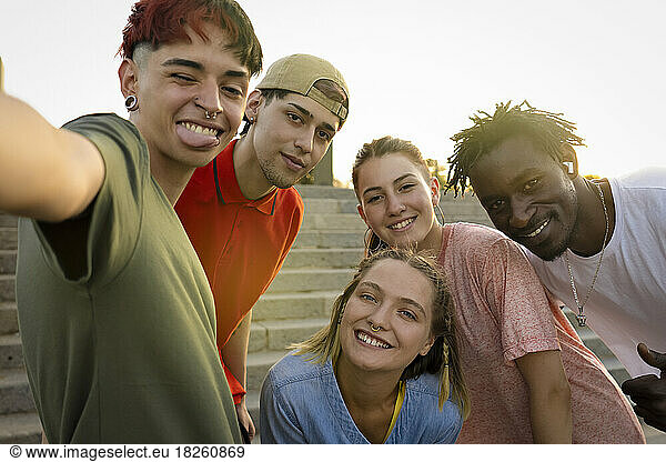 Multi-ethnic group of young people taking a selfie