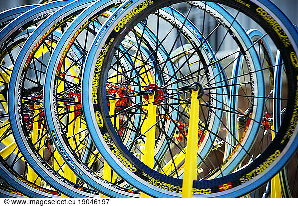 multiple colored bicycle racing wheels.