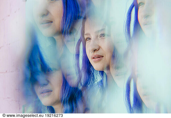 Multiple image of woman with blue dyed hair