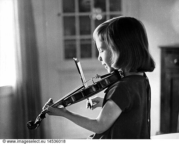 music  instruments  bowed instrument  girl playing violin  1950s