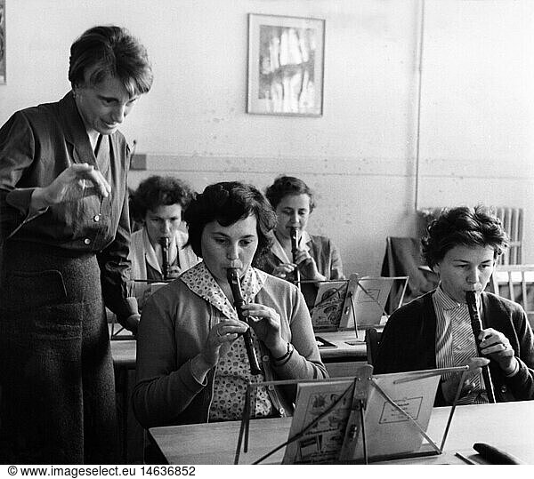 music  instruments  wind instruments  prospective kindergartners learning recorder  Friedrich Froebel School  Pankow  November 1959