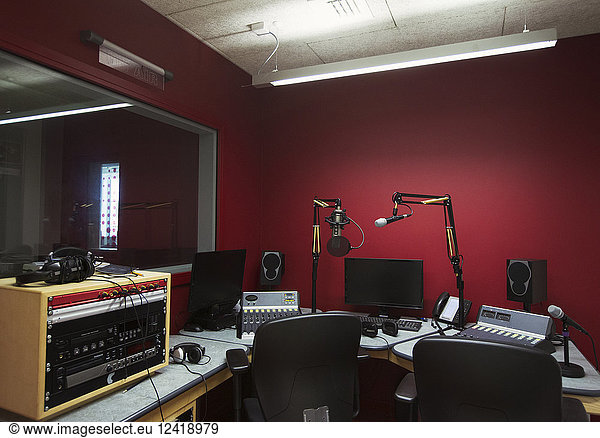 Music recording equipment in sound booth