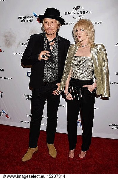 Musician-drummer Matt Sorum and Adriane Harper arrive at Universal Music Group's 2016 GRAMMY After Party at The Theatre At The Ace Hotel on February 15  2016 in Los Angeles