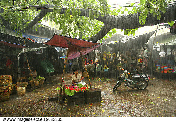 Myanmar  market in monsoon rainfall