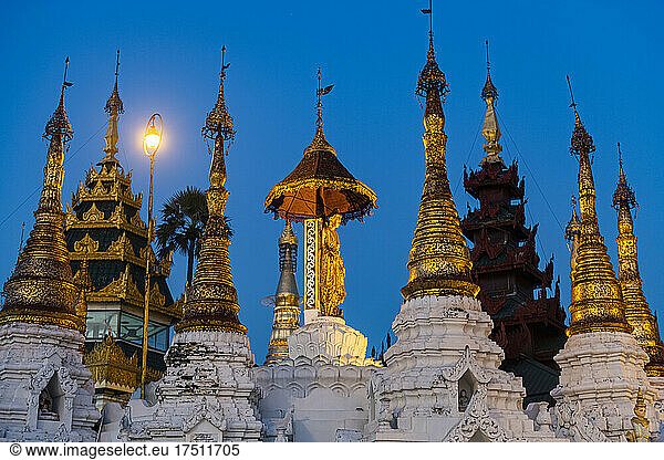 Myanmar  Yangon  Golden spires of Shwedagon pagoda at dusk
