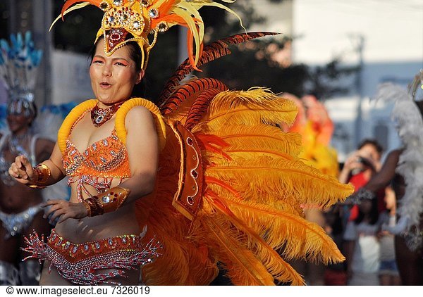 Naha  Okinawa  Japan  Brazilian-style  Japanese samba dancer along Kokusai-dori during the Naha Festival October