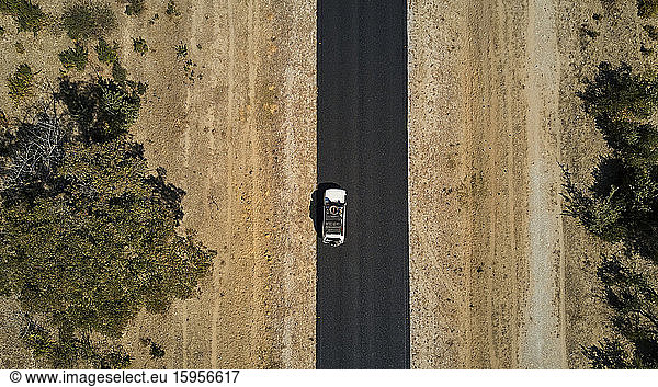 Namibia  Aerial view of 4x4 car driving along National Road B15