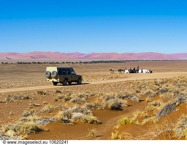 Namibia  Hardap  vehicle driving on dirt road