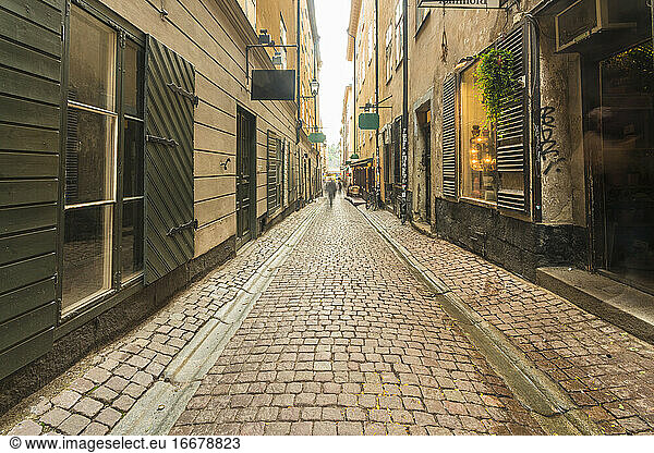 narrow street in Gamla stan old town in summer with nobody