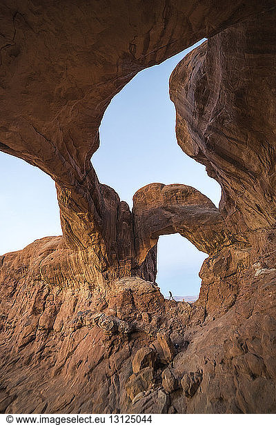 Natural arch at Arches National Park against sky