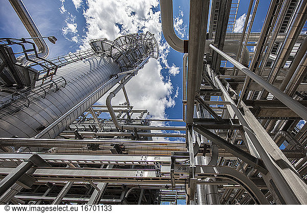 Natural gas processing plant structures with blue sky