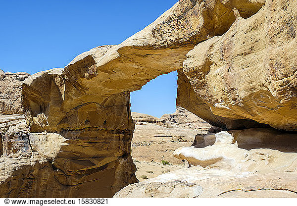 Natural stone bridge in Wadi Rum Protected Area  Jordan